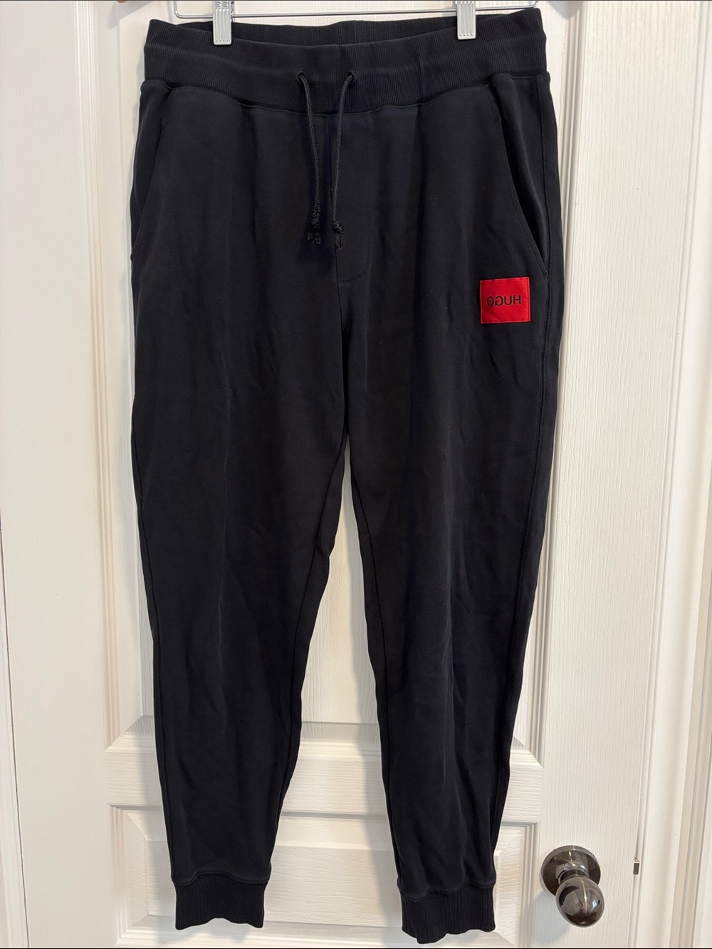 HUGO Black Jogger Sweatpants with Red Logo Patch